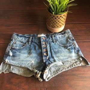 Free People distressed denim shorts
